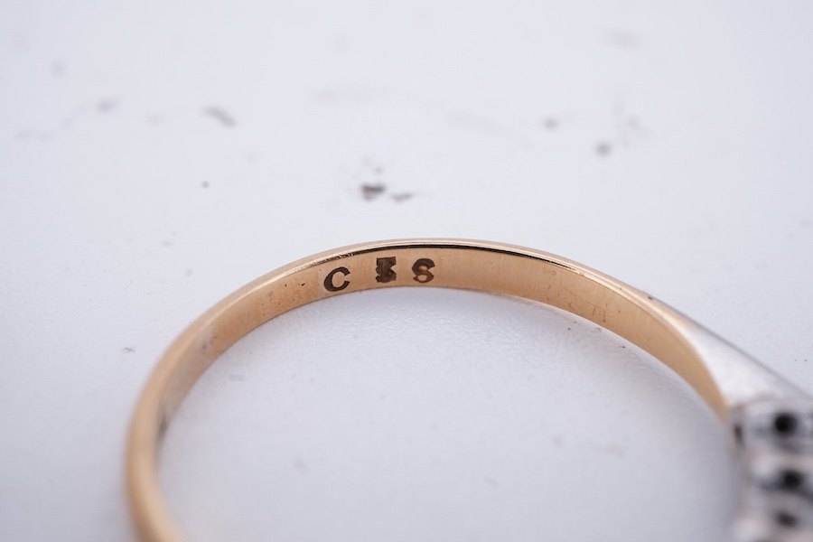 Two sapphire and diamond rings, each set with an alternating sequence of five sapphires and diamonds, mounted in gold and platinum, sizes P and P1/2, stamped 18ct and 18ct&Pt respectively, combined gross weight approxima